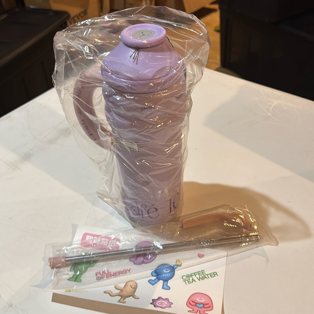 Brand new 40oz tumbler pink/lavender with strainer basket for tea/fruit
